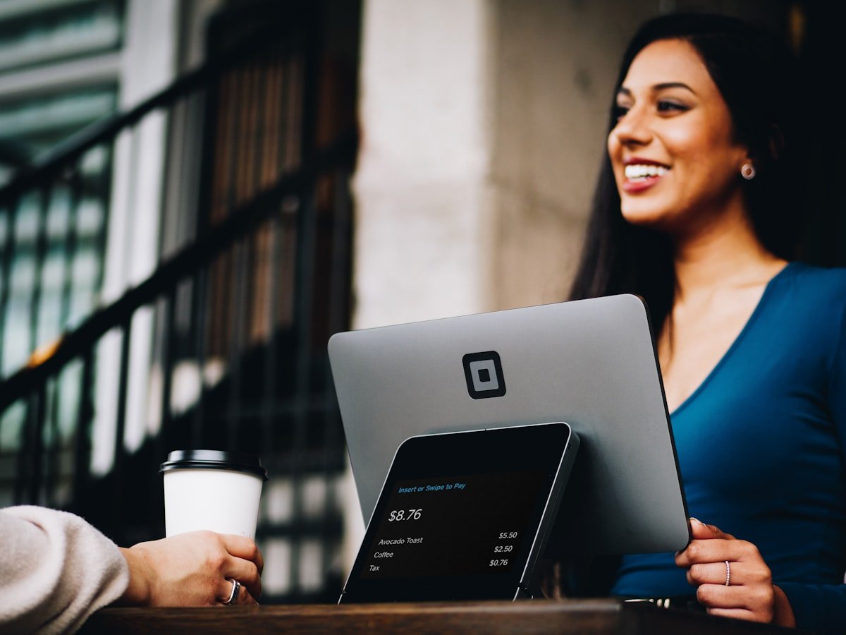 Marketer reviewing short form creatives on a laptop
